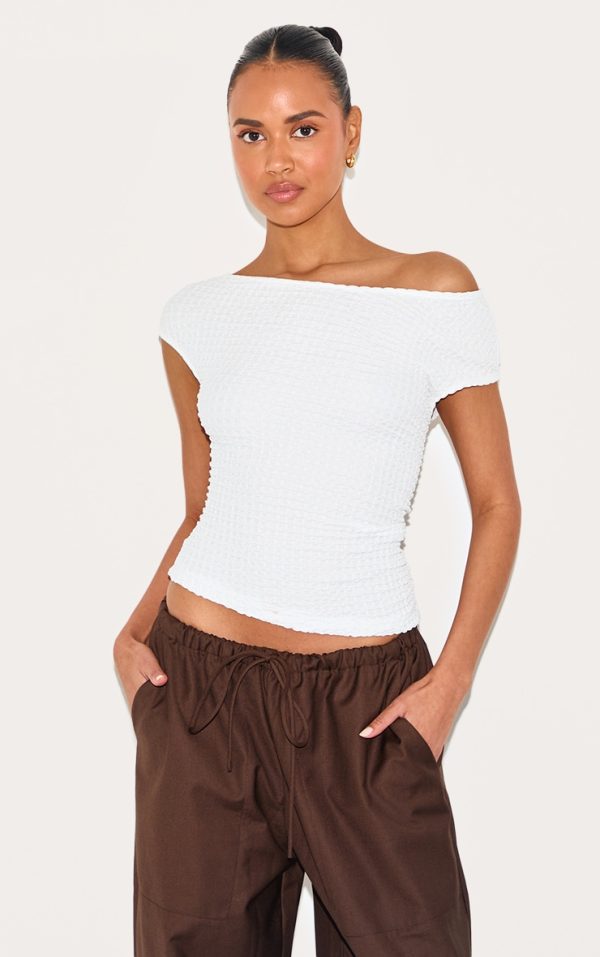 91bfdaebe14e83e0fbb916e58f8232794747ebcf_CNM4263_1_cream_textured_asymmetric_ruched_detail_long_top