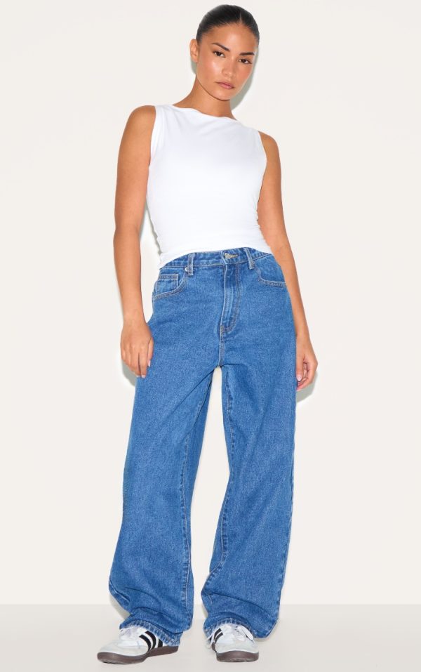 9209cd67790aa77f8d971dcbf1572908caf26076_CNL9764_1_prettylittlething_petite_dark_blue_high_waist_boyfriend_jean