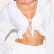 924072de8e19267926f9dc225e0b6a4cab41b279_CNM3231_4_white_cheesecloth_ruffle_tie_front_long_sleeve_top