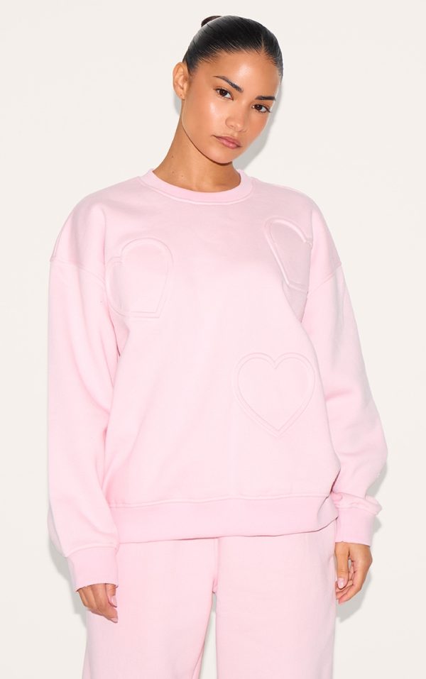 92e4d4a027fb9850dd59e0179e2dc60df88b77cd_CNH8045_1_petite_pink_embossed_heart_detail_sweatshirt