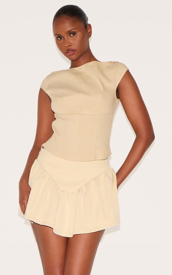 93081ac70f6628f479e7fba40378a28d75cdccd6_CNL9201_4_butter_cream_dipped_waist_structured_a_line_mini_skirt