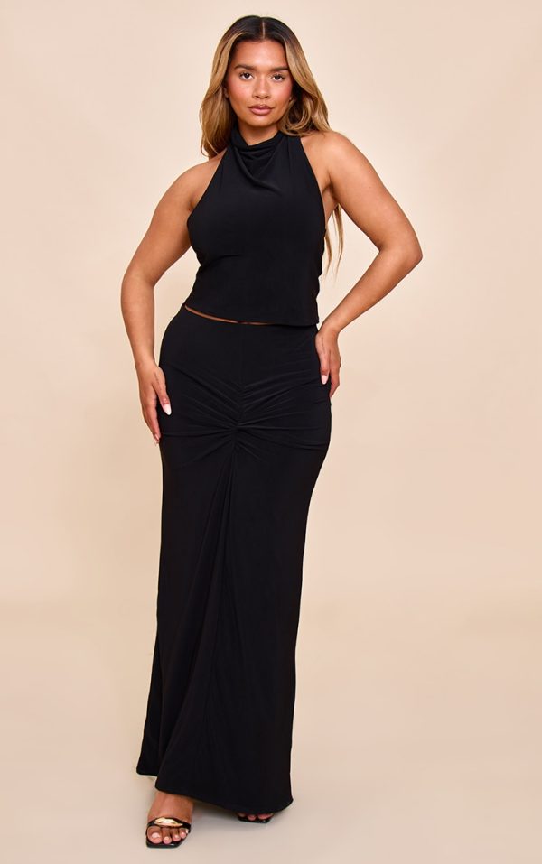 9309abc1c5fb2c07018fa196a60b055aaefad988_CNN4099_1_shape_black_mid_rise_ruched_side_maxi_skirt