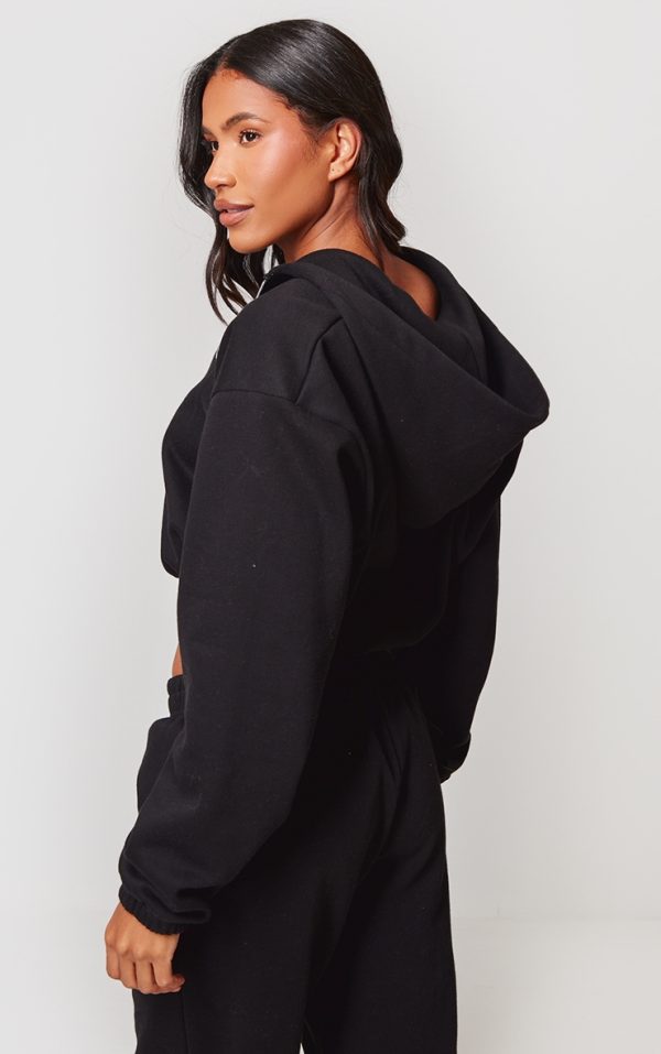 93104b55eedb025c23b6b9315495efc0d6fe9a50_CNK1544_2_prettylittlething_black_elasticated_hem_zip_up_hoodie