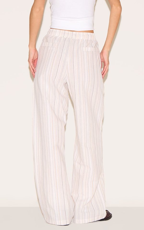 9342fa6e458744a64b4a0393c3e5cc8f8400eb1e_CNL9332_3_beige_pinstripe_printed_drawstring_waist_slouchy_trousers