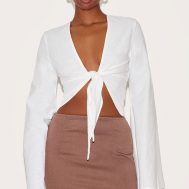 934f95268933d41d283e44293a55d425fc27256a_CNM4653_1_white_lightweight_woven_knot_front_drape_detail_blouse