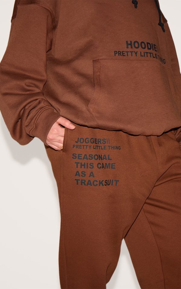 946fd9e63c20cb7ff424e17117e3e471e73fb3ac_CNE5423_4_prettylittlething_plus_chocolate_slogan_print_joggers