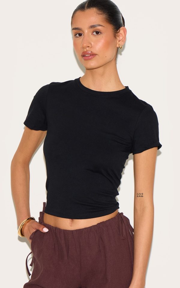 94aa2a597d3f7d6183d1e616b889587fee1af548_CNN1964_1_tall_black_soft_cotton_crew_neck_short_sleeve_top