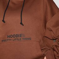 9521a19ec6367d8a7caa63b5a1f76a862675bb08_CNE5424_4_prettylittlething_plus_chocolate_oversized_fit_slogan_printed_hoodie