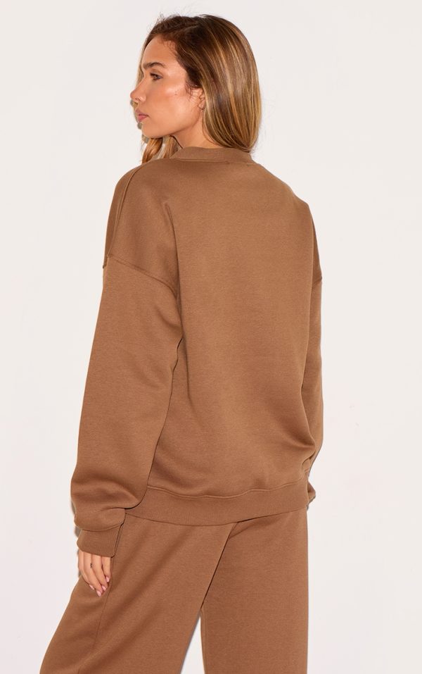 95bb80fe93fb064d32a5b9586aed25088d84fa75_CNM4802_2_taupe_button_front_pocket_sweat_cardigan