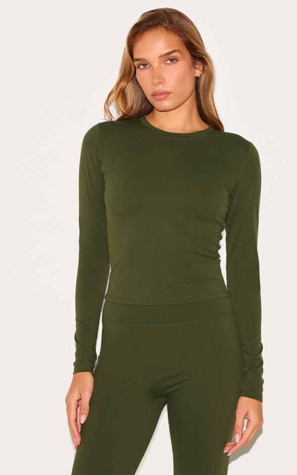96d7b5fe4725855bfcbd824ad7db7c45ef0373a0_CNL8652_1_forest_green_sculpt_long_sleeve_crop_gym_top-1