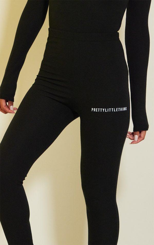 96dc433848ce10b9b13a6d20093cea369a7fe5d6_CMW7183_4_prettylittlething_black_crinkle_rib_split_hem_leggings