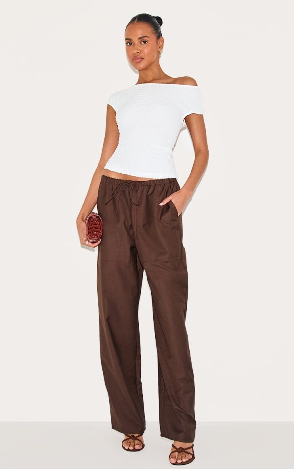 976ae83e4531924676e16f99a66913e6bcc2f228_CNM4263_3_cream_textured_asymmetric_ruched_detail_long_top