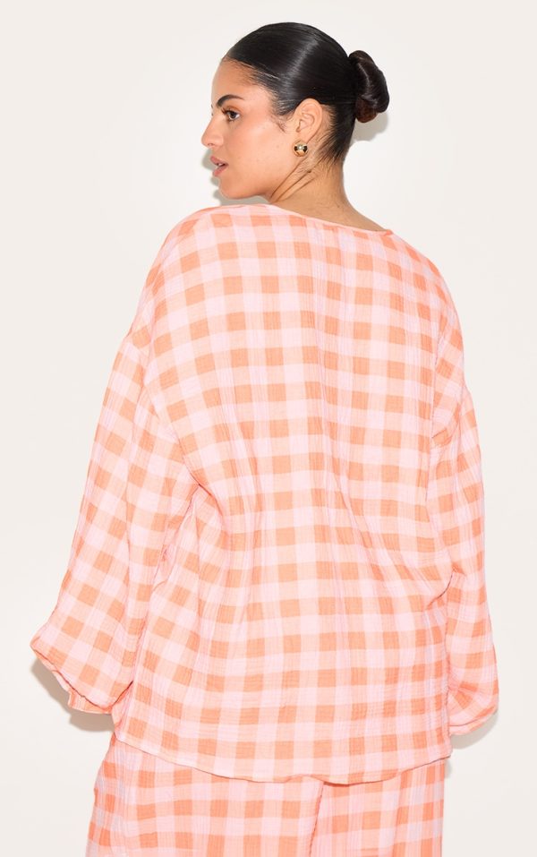 98277f3a7a262ef3d9fb686fb3268fc3e1a2cf03_CNM3360_2_plus_orange_checked_cheesecloth_tie_front_long_sleeve_shirt