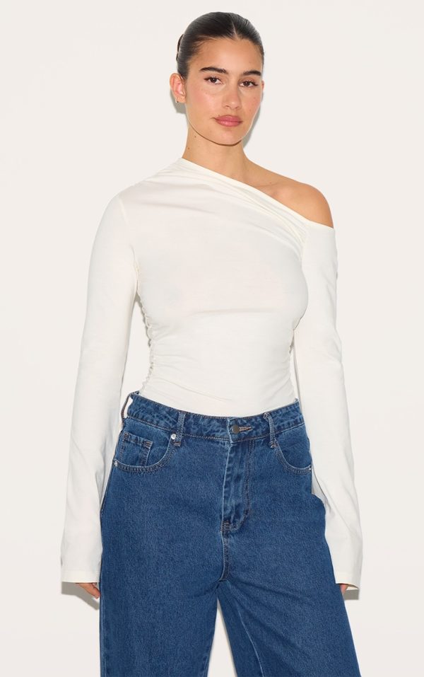 9847c2e8c5d54ff3d366c0efdccd8aa3ef52025d_CNM3765_1_cream_asymmetric_ruched_flared_sleeve_long_top