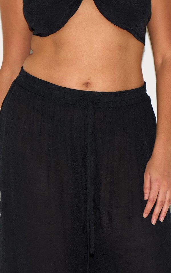 988428fb97c05f4e769e453748f827d6aaa6024f_CNM3060_4_plus_black_trousers_and_top_set-1