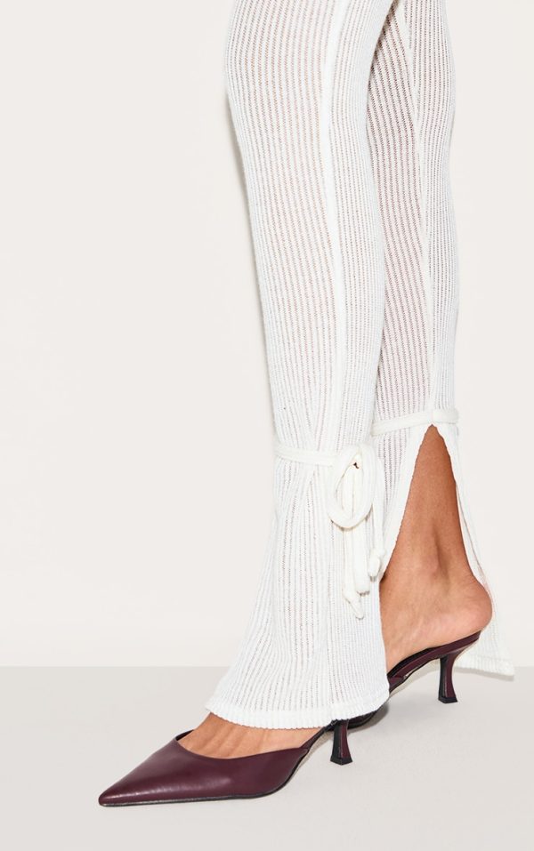 989f802c76060b7130992c9d9a028b13dafad489_CNK4890_4_cream_sheer_soft_rib_split_hem_tie_detail_leggings