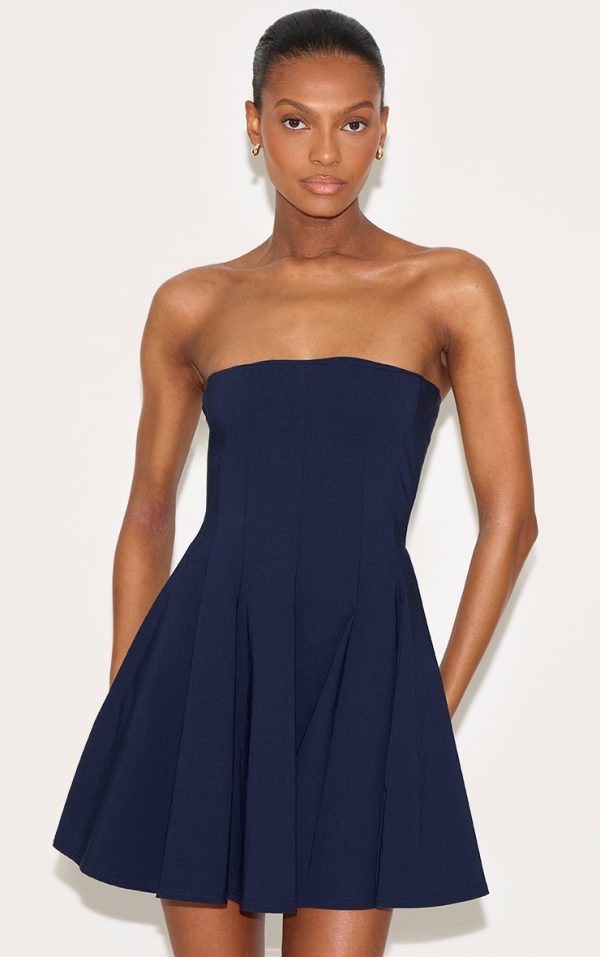 99625c6b076084e085863d39784fe594ac1f3dc0_CNN1640_1_navy_stretch_woven_bandeau_pleated_shift_dress