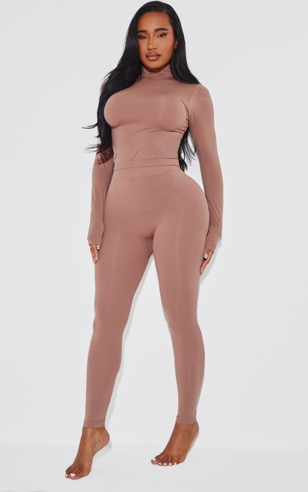 9964d2e34757f3997d2e08b75afb90d476a83220_CNJ7986_3_shape_taupe_stretch_seamless_high_neck_long_sleeve_top