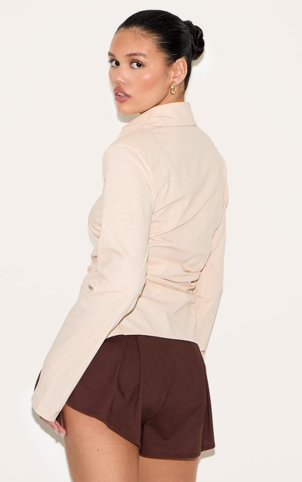 997c9969ef584ac0d90ed9c5530f4524ca4f4b10_CNM3782_2_beige_linen_blend_shoulder_padded_fitted_shirt-1