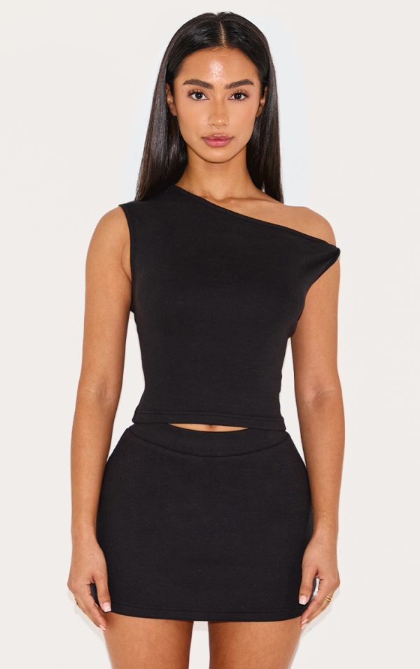99aba2f427dfd656c43562e1e50987a099e84bf1_CNL9158_1_petite_black_ribbed_twist_detail_top