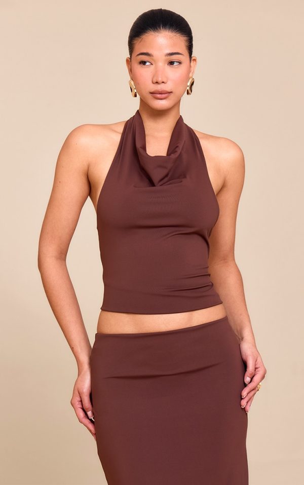 99e7d49e0ea693992a1a33e753aa0eccbd84785c_CNN0910_1_chocolate_brown_matte_sculpt_halterneck_gold_detail_backless_top