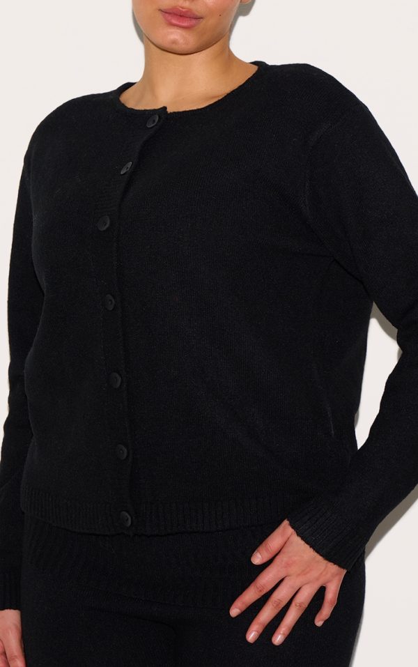 9a1214a67cbeb43bf4c79344e0b3ee2014a7fef6_CNJ1990_4_plus_black_melange_soft_knit_foldover_waist_flared_trousers