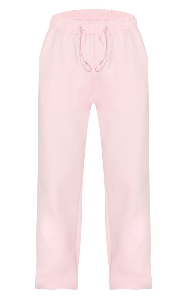9afece2c051dc2c5b9249940c9795a67c0834a19_CNM7122_5_baby_pink_drawcord_hem_oversized_joggers