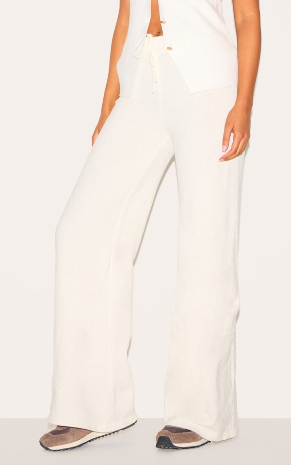 9b10af9da32b04f106dfdd600a349c47cfb33845_CNJ2256_2_tall_oatmeal_soft_textured_knit_drawstring_wide_leg_trousers