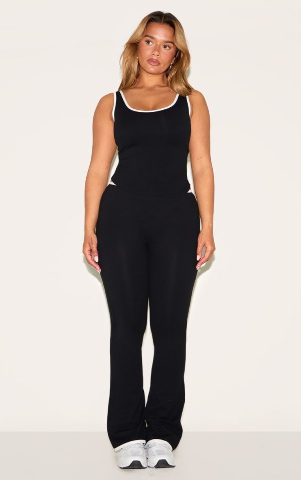 9b57811bfc1134007683f41e4f30974699c6319b_CNM6281_3_shape_black_active_contrast_binding_longline_top
