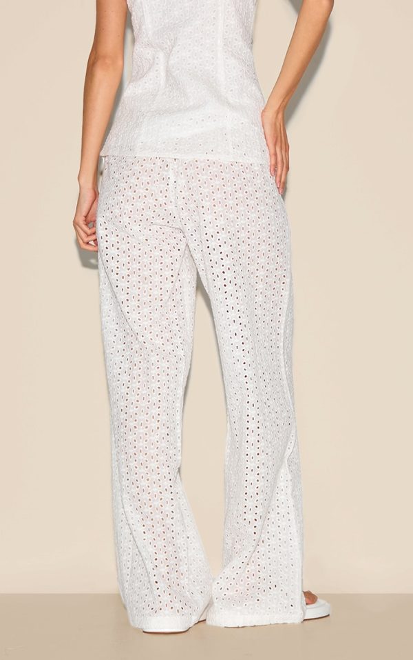 9b5a12b4864f301c9c15d30b31719cbb0ef858a1_CNM3200_3_white_embroidered_mid_rise_trousers