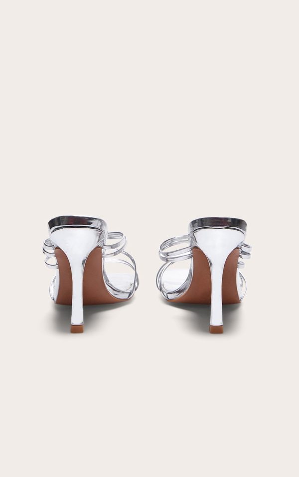 9bdadda7c1db60593de6c39147a547ffe70e7a34_CNE7948_3_silver_pu_square_toe_multi_cross_strap_detail_mid_heeled_mules