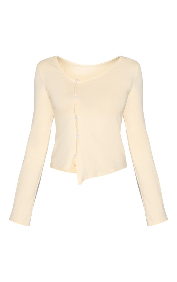 9c7f2ee91c11eb08ae431a77fee96ae0eddeeb5b_CNM6354_5_almond_asymmetric_button_down_detail_long_sleeve_top
