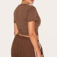 9cdc5704e9aaa3fa2f27de76fbd1416f5c7acd3a_CNL9674_2_prettylittlething_plus_chocolate_cropped_baby_tee
