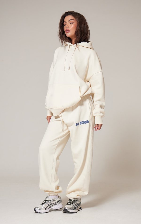 9cfb138fcf10c004881ebe12b8993a72212821b3_CNK1745_1_prettylittlething_sand_premium_studio_print_cuffed_joggers