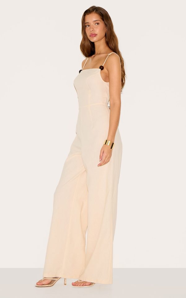 9d6f87f2700608ce7f96bfd0ff00eb7b18094ba6_CNM7291_3_natural_linen_blend_boat_neck_bead_detail_jumpsuit