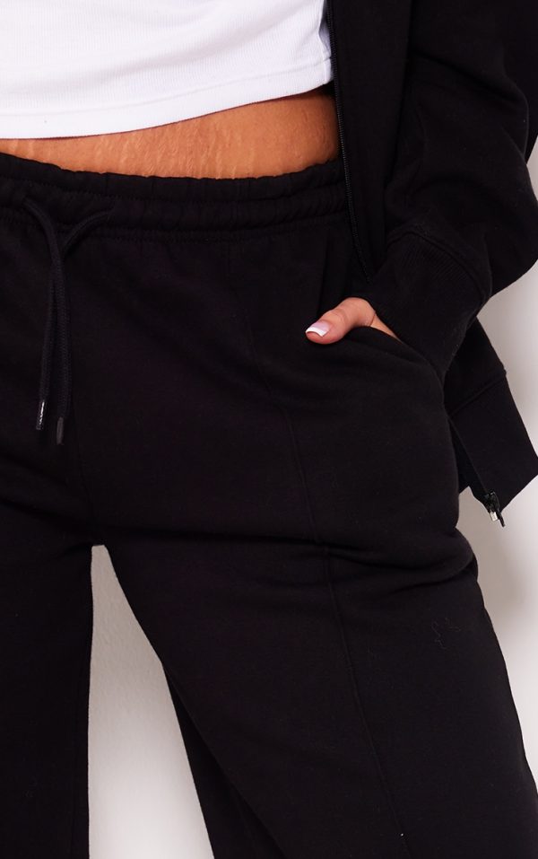9d7d33ab56b6d7740b293040104956330441c8aa_CNH4173_4_plus_black_mid_rise_seam_detail_straight_leg_joggers
