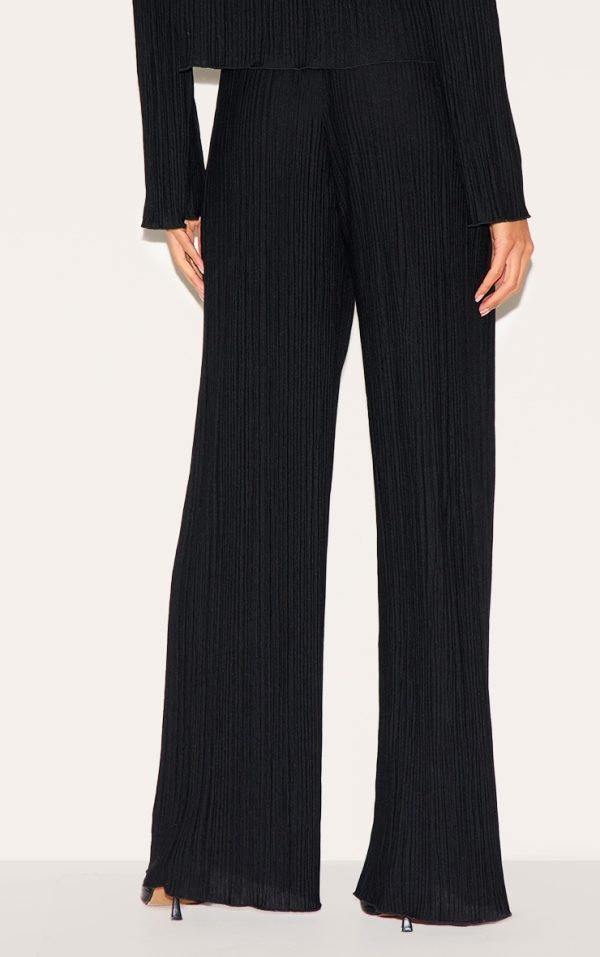 9e3b5251611ba47f01532edccda5df452f4880df_CNK4805_3_black_textured_pleated_wide_leg_trousers