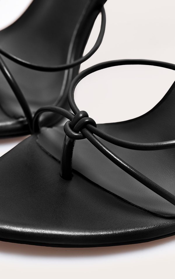 9ef7a4069222b2ad5547e76b35fcbca54573b5ba_CNL8253_4_plt_label_black_strappy_tie_thong_heel