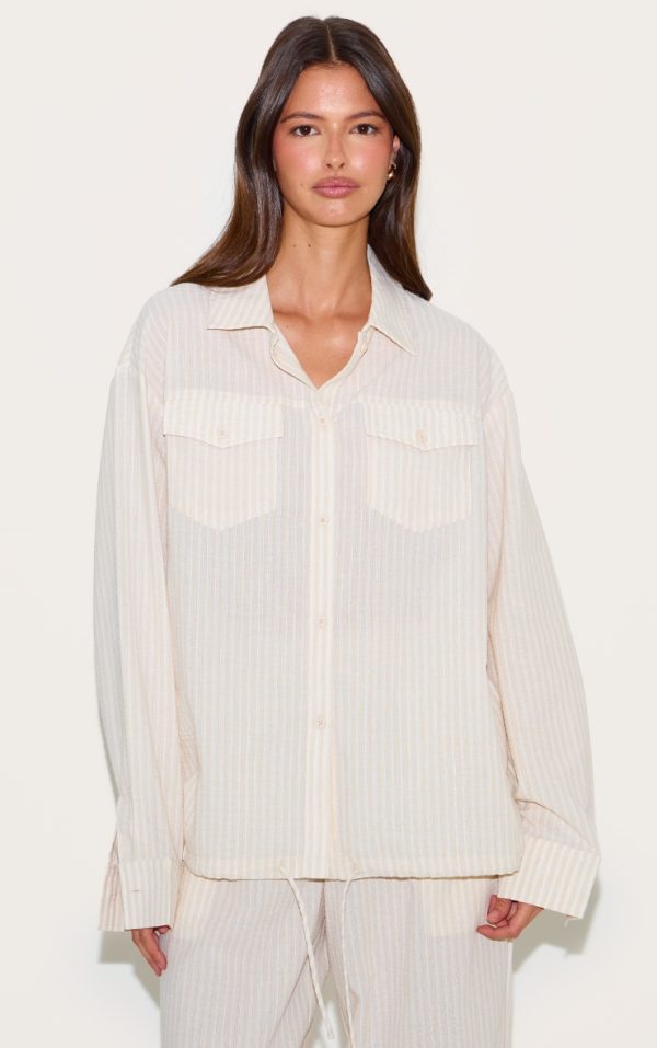 9f0048d15080de67e298d51d3b2843de22d7ff8a_CNL9425_1_stone_striped_linen_pocket_detail_oversized_shirt