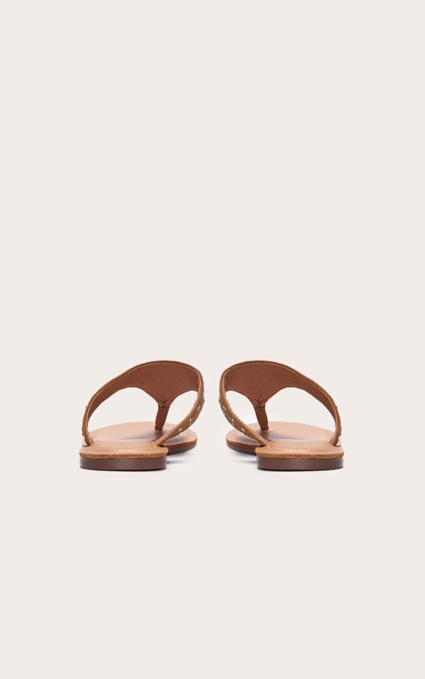 9f12d9437ca16cdc64f73b1a405ff9da0caf330d_CNL7097_3_tan_faux_suede_stud_detail_toe_thong_flat_sandals