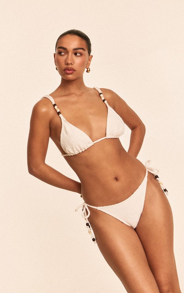 9f1fee995e2d22851957d44123767a02d5c03e0c_CNM6709_3_white_textured_bead_trim_tie_side_bikini_bottoms
