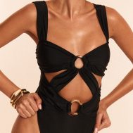 9f30b98e152a3385bc9558c061bdbcbbede5dc92_CNM1262_1_black_o_ring_ruched_cut_out_swimsuit