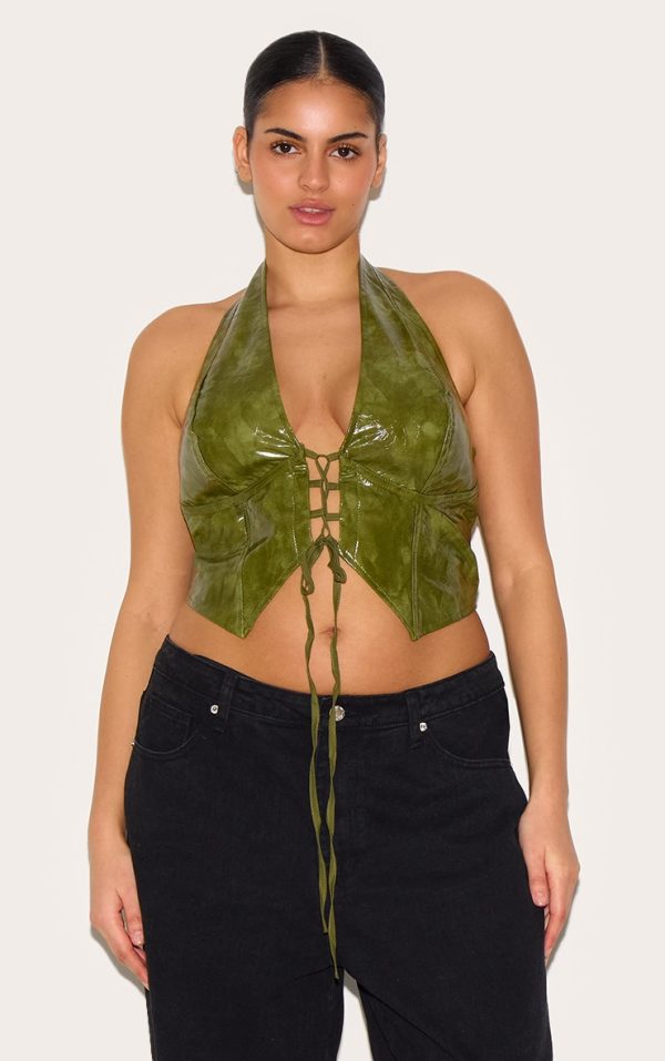 a11dba8f1c95bca84961cd4f1135b7faf8112272_CNL8702_1_plus_washed_olive_faux_leather_lace_up_plunge_halterneck_top