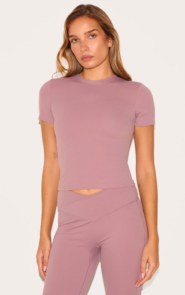 a15320bf35f0c5e1f580e99fa58aa9f049f36059_CNM0254_1_mauve_sculpt_longline_short_sleeve_gym_top