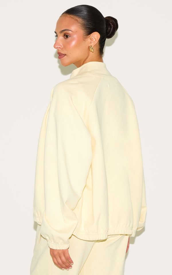 a18d12e6aaaa4635b90172bcf8968e5c6e9824b0_CNM7244_2_petite_butter_cream_oversized_interlock_zip_through_sweatshirt