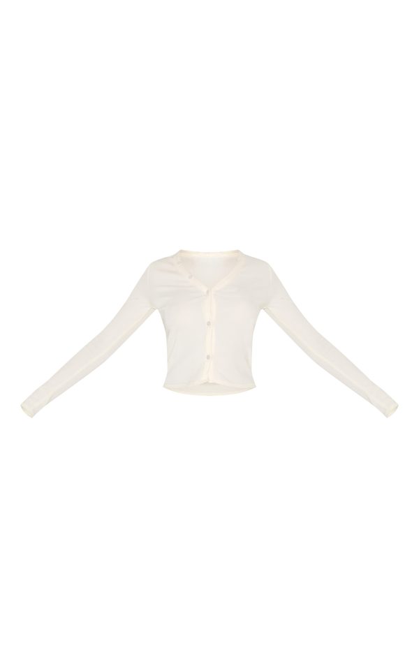 a2b0a263583e0ff57e225fa6003a399396251177_CNL8973_5_cream_soft_touch_rib_asymmetric_button_down_long_sleeve_top