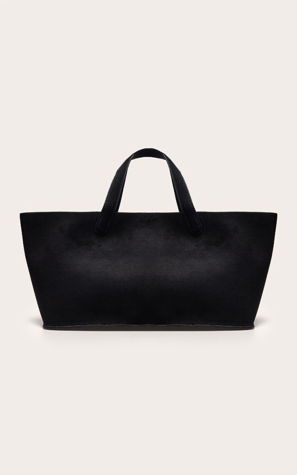a2ce6f3f48ceb8f19b772b44e13b431109891290_CNL9836_1_black_faux_suede_elongated_hand_bag