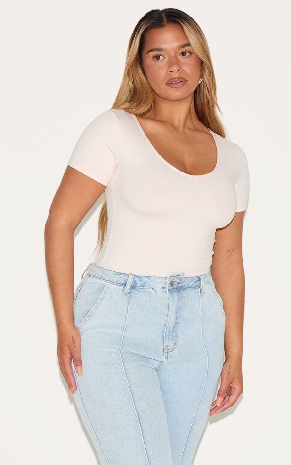 a3d4c5dd95f86b4543a589abc0c4d5af356748de_CNM8308_1_shape_blush_sculpted_v_neck_short_sleeve_bodysuit