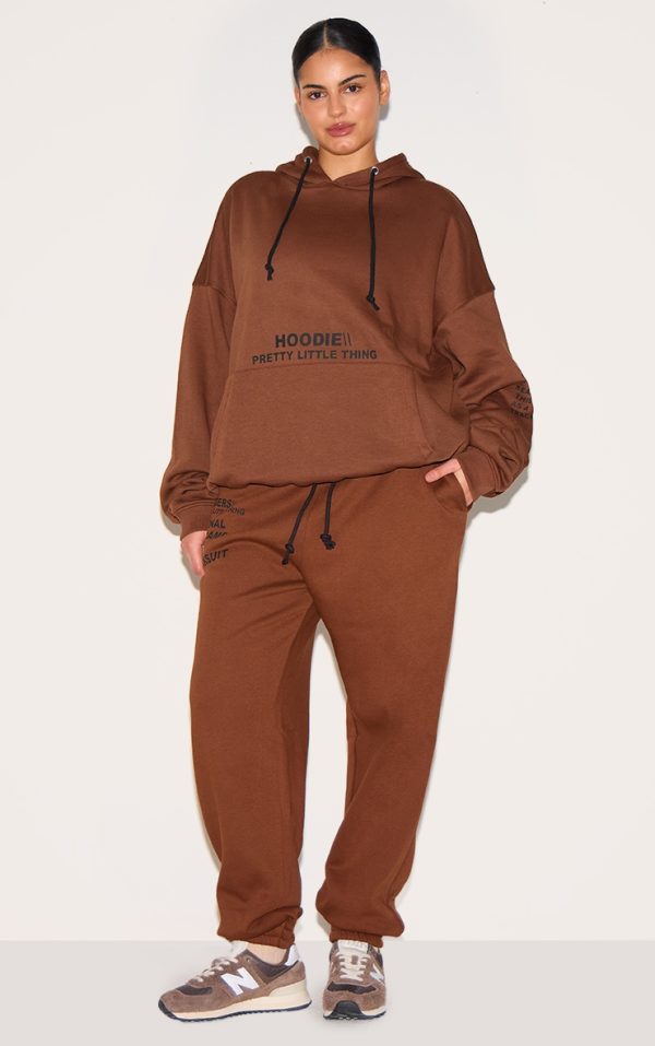 a4887f0f86e049489371d326c149e94a87d817e6_CNE5424_3_prettylittlething_plus_chocolate_oversized_fit_slogan_printed_hoodie