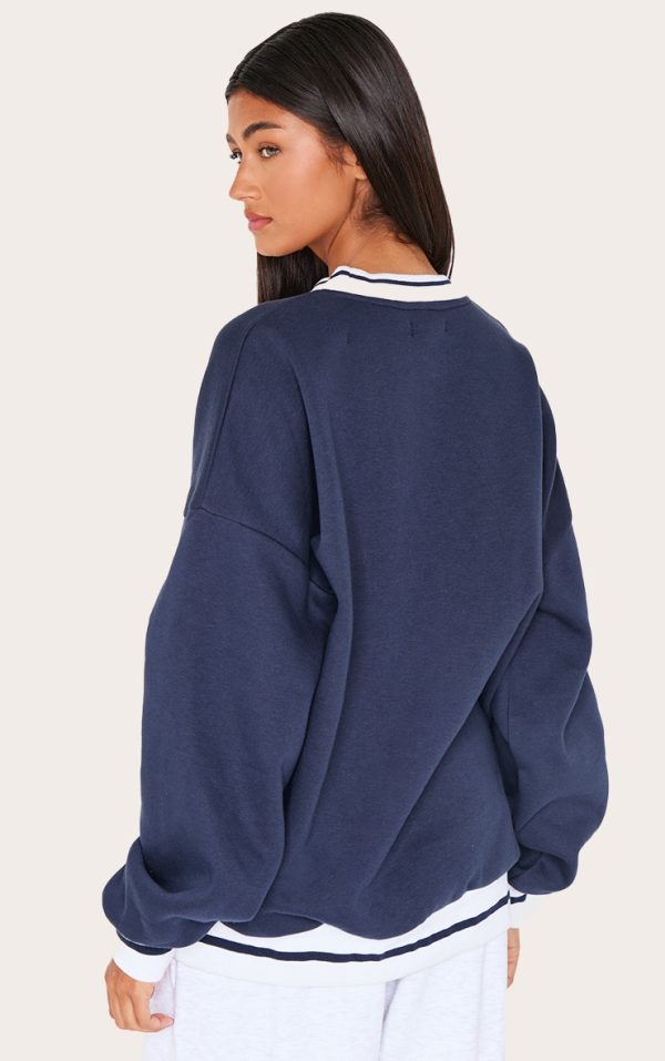 a4e377cf87c280357db6d47802f73f65dacbcee1_CNL4112_2_navy_striped_ribbed_hem_oversized_sweatshirt